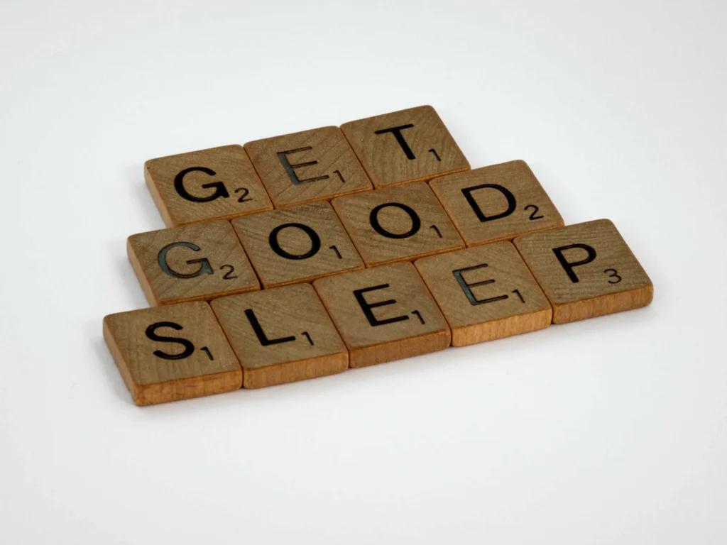 Scrabble tiles spelling "Get Good Sleep"