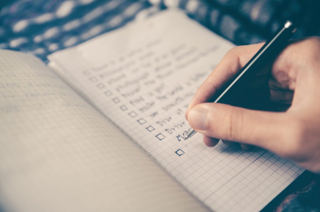 Person writing task list